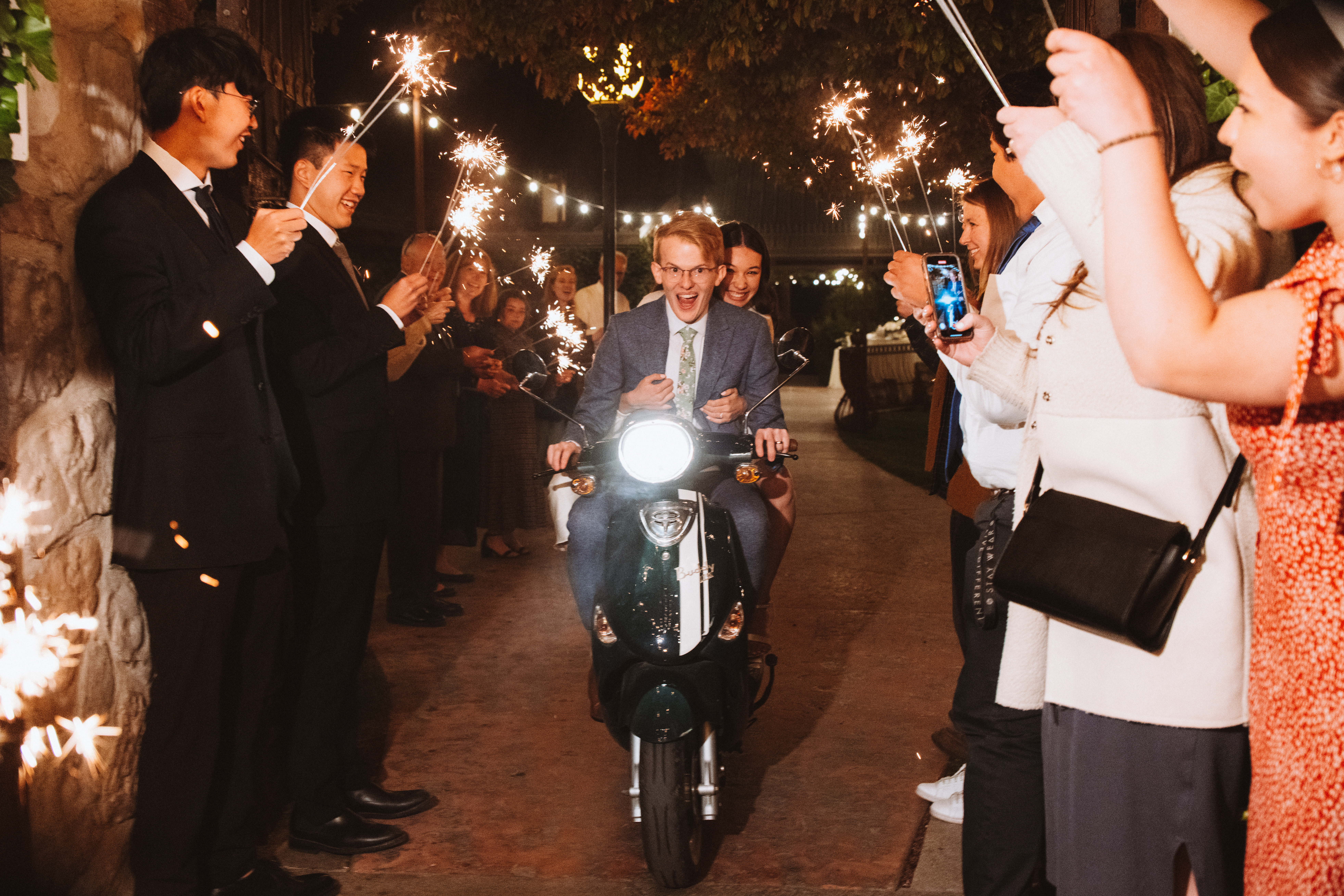 Driving with my wife out of my wedding on the moped